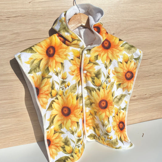 Bright yellow sunflower baby hooded beach towel with easy access clips at the front